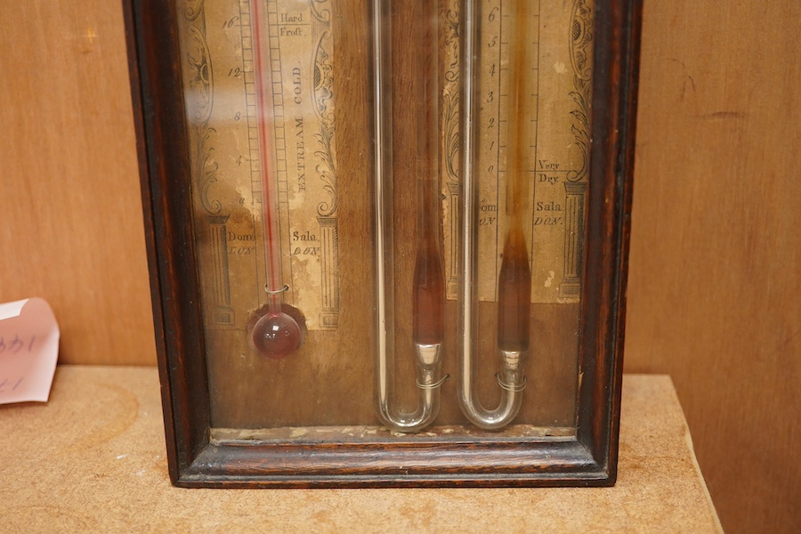 A George III mahogany multi-tube barometer together with integral thermometer by Sala, London, in a mahogany glazed case with arched pediment and three brass finials, paper scales with maker’s mark, height 61cm. Conditio